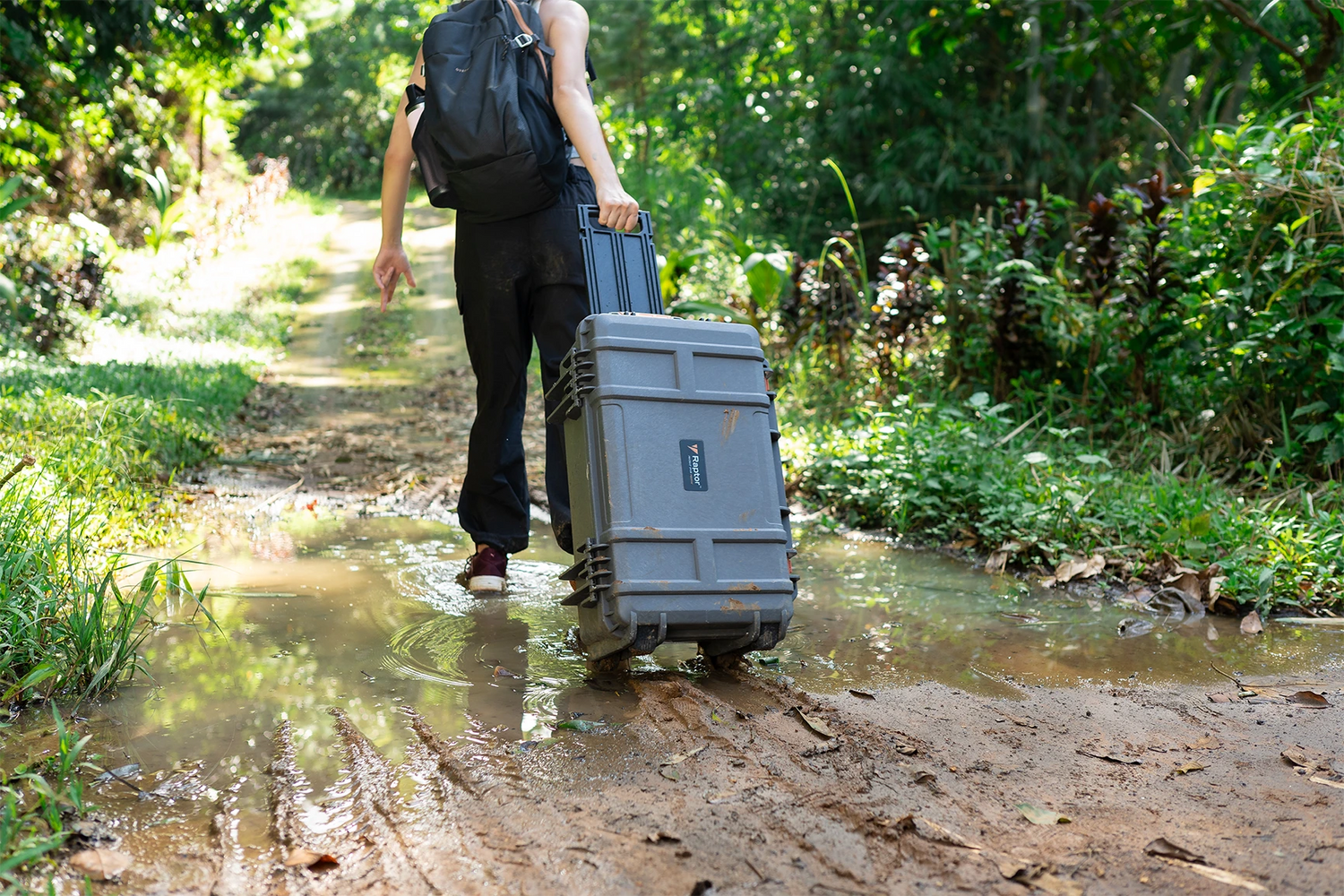 Person pulling a Raptor Air Trolley Case